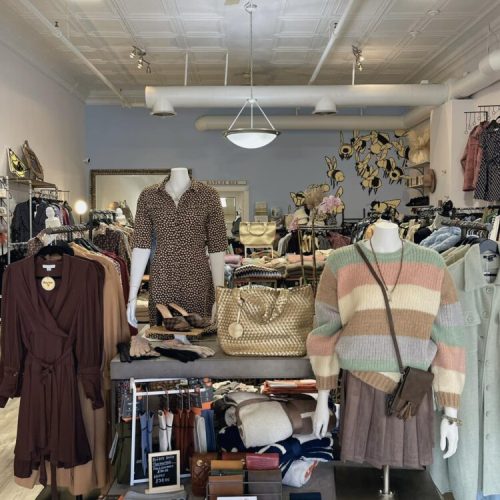 A clothing and purse display at Baylee Bees